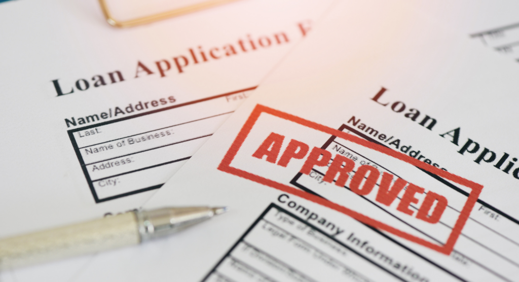 loan application with approved stamp in red